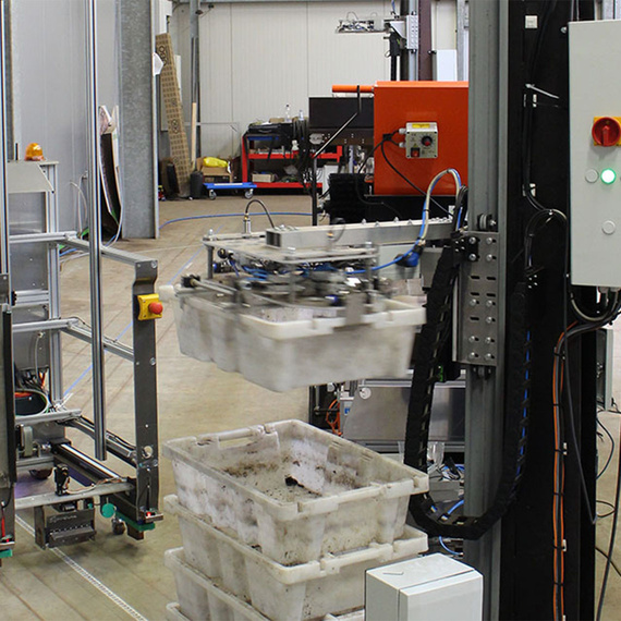 Automated guided vehicle system at the feeding station